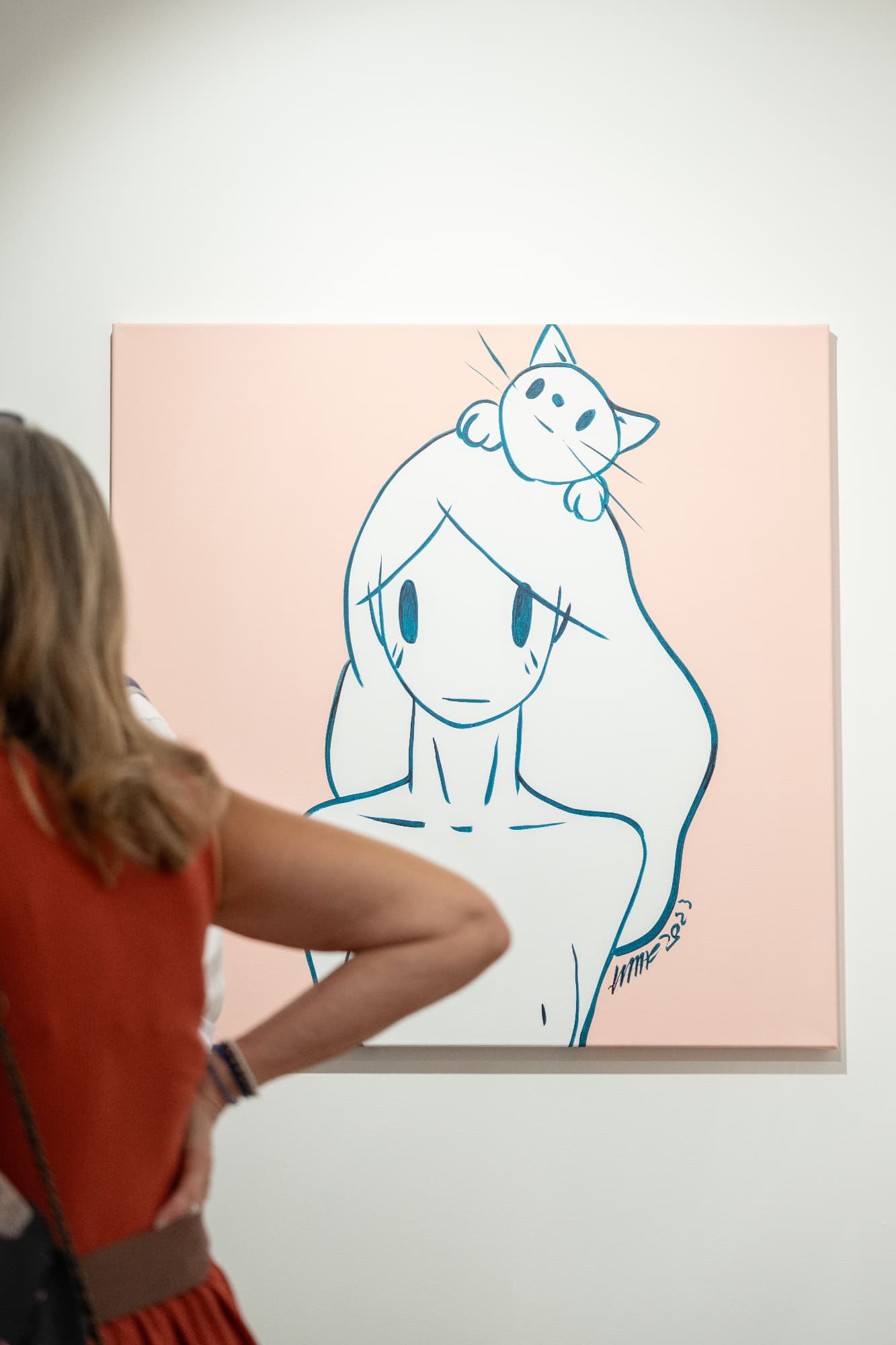 Oeuvre de Takeru Amano avec une femme et un chat